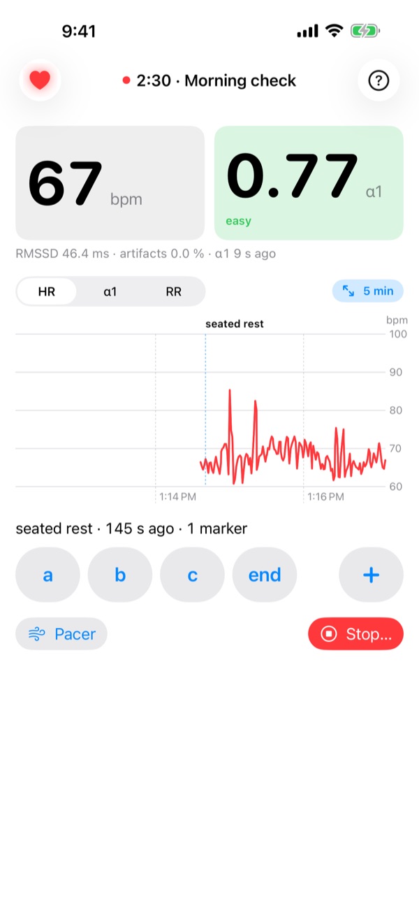 StrapLog recording screen: heart rate 67 bpm, DFA α1 0.77 in the green easy band, heart-rate chart with a marker